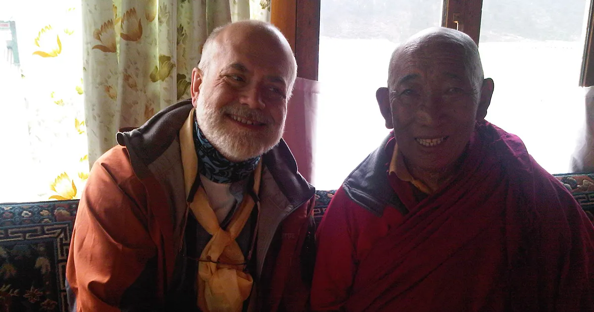 Trekkers with a monk in Pangboche Monastery