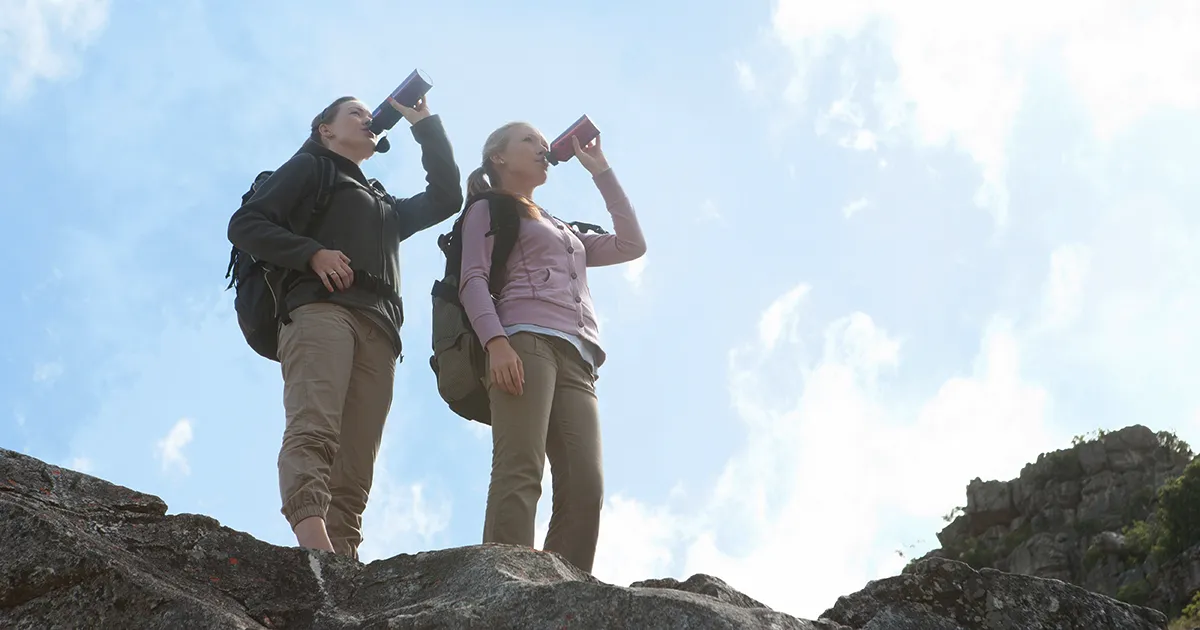 Trekkers hydrating on the trails