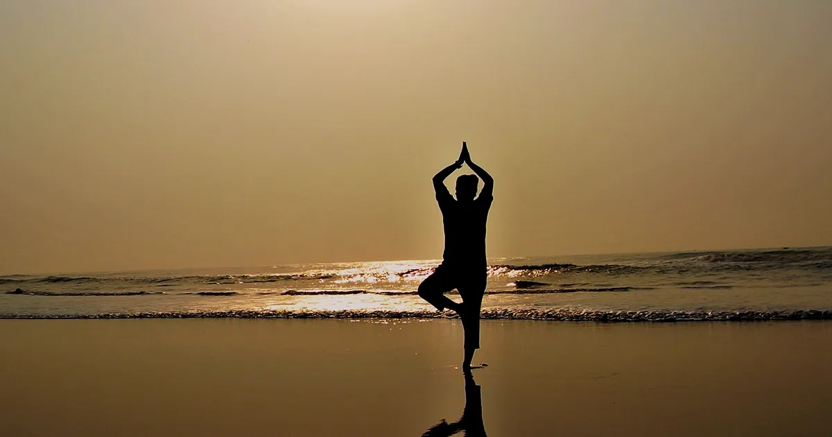 Pilgrim doing Surya Namaskar