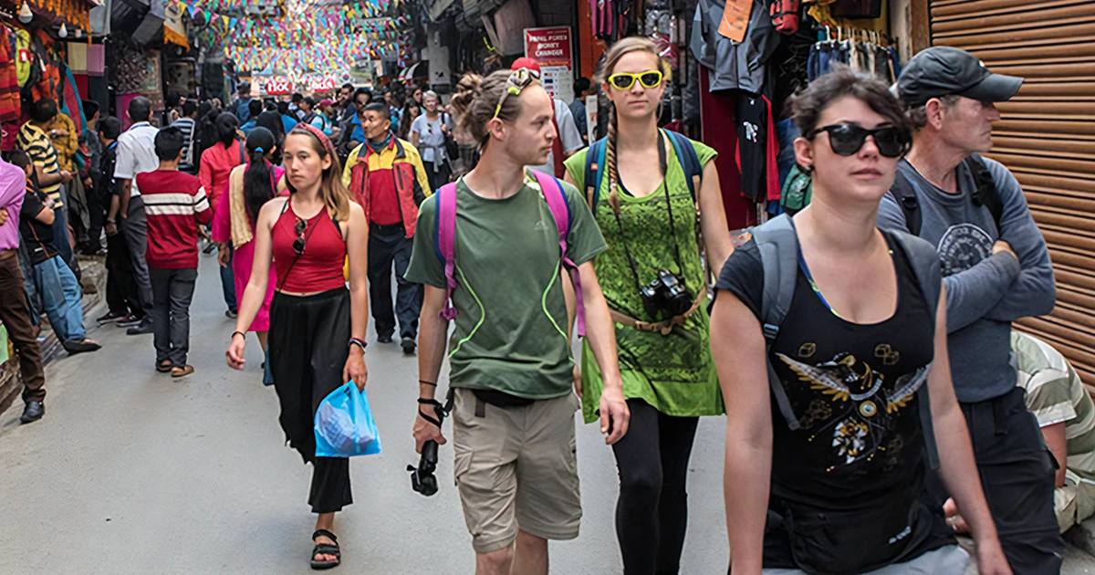 Tourists Walking Through Streets