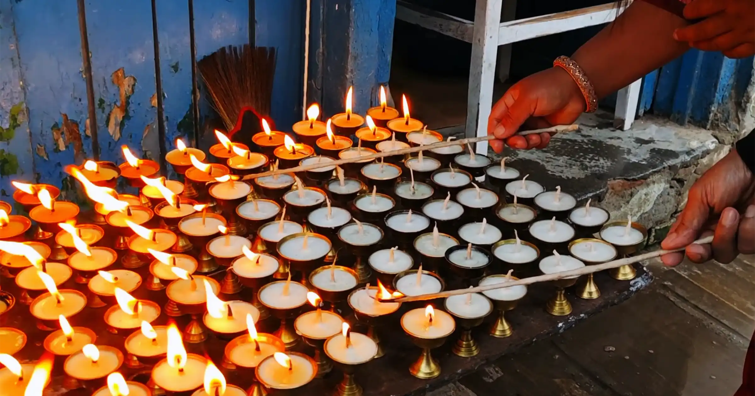Devotees Burning Butter Lamps in Boudhanath 